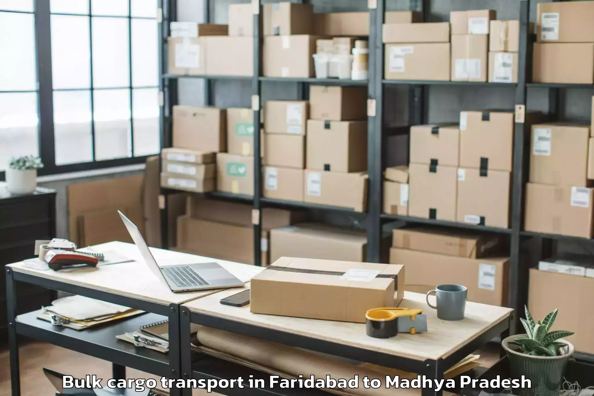 Book Faridabad to Ajaigarh Bulk Cargo Transport